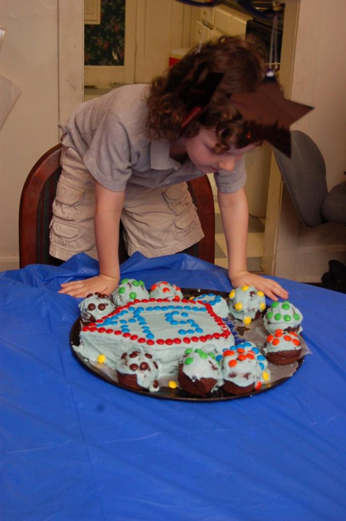 Isaiah with his rocket cake - FIVE! 